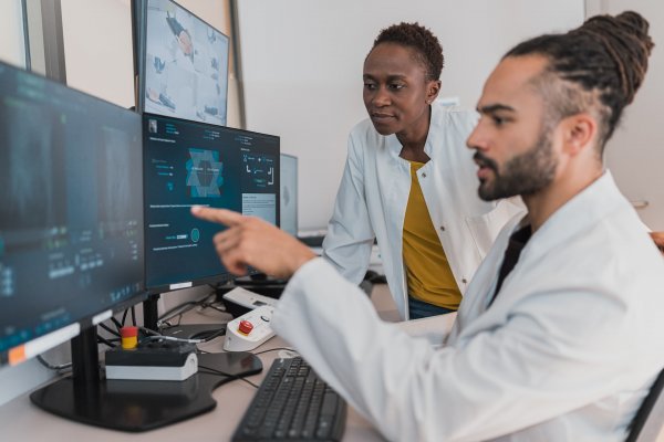 doctors reviewing results on monitors